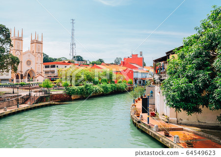 Church of St Francis Xavier and canal in Malacca, Malaysia 64549623