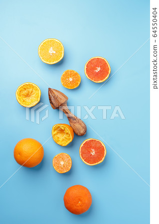 sliced lemons oranges and tangerines on a blue sliced lemons oranges and tangerines on a blue 64550404