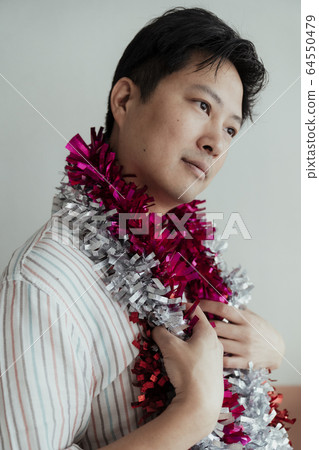 Asian gay's smile. 64550479