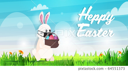 rabbit wearing mask to prevent covid-19 coronavirus pandemic quarantine happy easter spring holiday 64551373