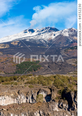 Mount Etna volcano with smoke - Sicily island Italy Europe 64552230