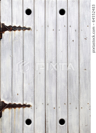 Medieval window shutter with rusty hinges 64552483