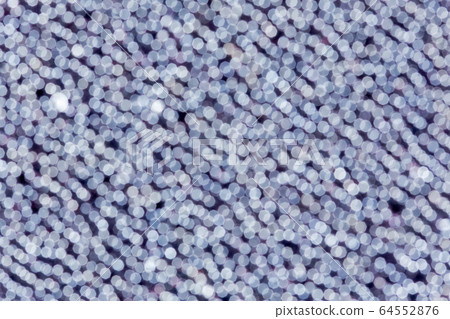 White bokeh, blured lights on dark blue background. 64552876