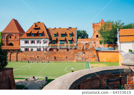 Old town castle fortress ruins in Torun, Poland 64553619