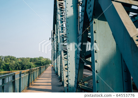 Jozef Pilsudski bridge and Vistula River in Torun, Poland 64553776