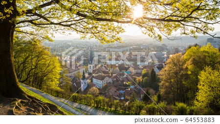 Panoramic view of Ljubljana, capital of Slovenia. Roooftops of Ljubljanas old medieval city center seen from Ljubljanas castle park at sunset Panoramic view of Ljubljana, capital of Slovenia. Roooftops of Ljubljanas old medieval city center seen from Ljubljanas castle park at sunset 64553883