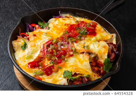 Mexican enchilada mexican tortilla rolls (enchilada) Mexican enchilada mexican tortilla rolls (enchilada) 64554328