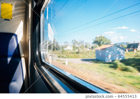 Countryside village by train window in Russia 64555413