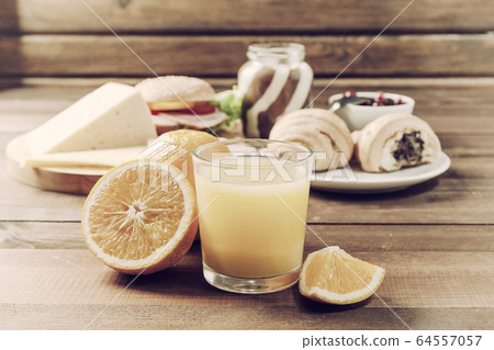 Breakfast with orange juise and croissant 64557057