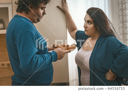 Conflict Of Plus Size Family due to a diet disorder Conflict Of Plus Size Family due to a diet disorder 64558715