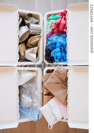 Waste Sorting at Home Above View Waste Sorting at Home Above View 64559423