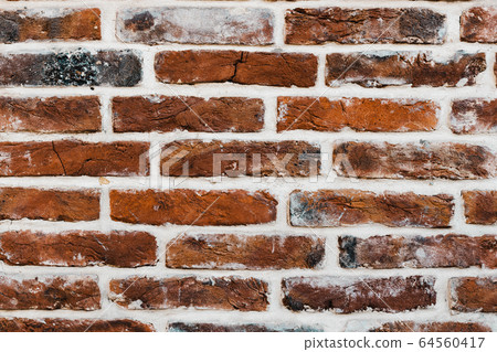 Grunge background with red  bricks 64560417