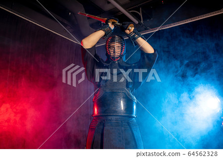 male kendo fighter in traditional Japanese style of clothing 64562328