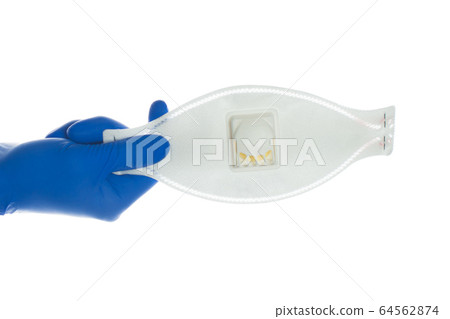 Medical mask in hands isolated on white 64562874