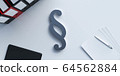 Paragraph symbol on white office desk with folders, pen and paper sheets 3d illustration render 64562884