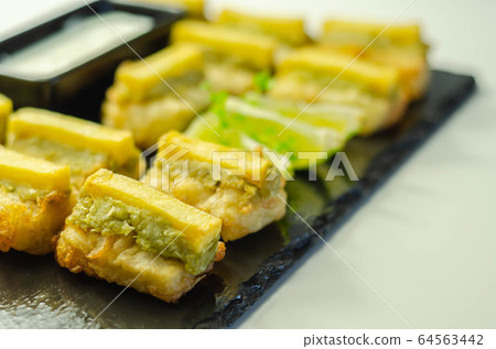 Skinless and boneless battered Alaska Pollock 64563442