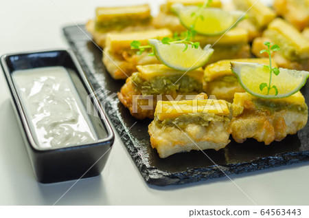 Skinless and boneless battered Alaska Pollock Skinless and boneless battered Alaska Pollock 64563443