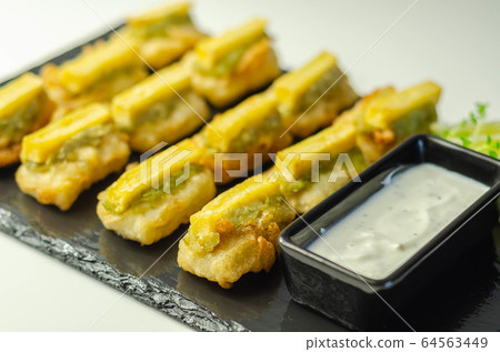 Skinless and boneless battered Alaska Pollock Skinless and boneless battered Alaska Pollock 64563449
