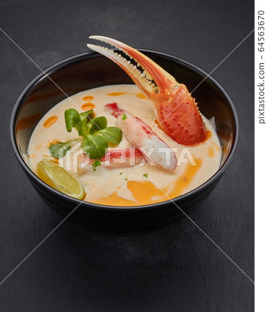Spicy soup with crab. Thai cuisine.  64563670