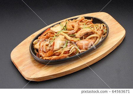 Udon noodles with seafood. Thai cuisine. 64563671