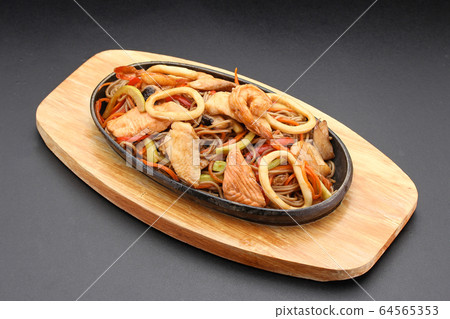 Soba noodles with seafood. Thai cuisine. Soba noodles with seafood. Thai cuisine. 64565353