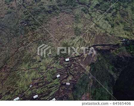 The Sunrise On The Volcano Batur On The Island Of Bali In Indonesia 64565406