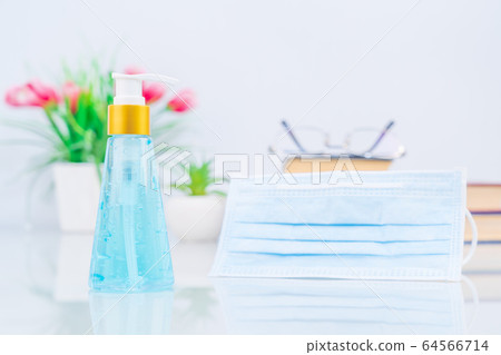 Surgical mask ,Medical face masks and Alcohol gel bottle sanitizer hand for anti bacteria  on deck 64566714