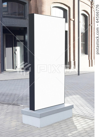 Blank white vertical pylon stand mockup brick building, side view Blank white vertical pylon stand mockup brick building, side view 64566776