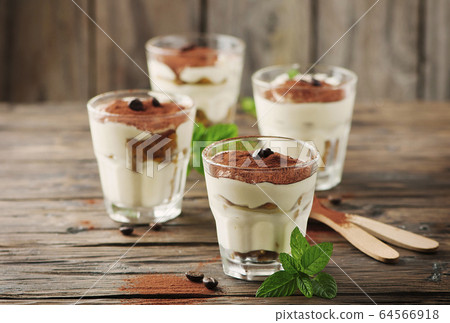 Traditional italian cake tiramisu with cookie and 64566918