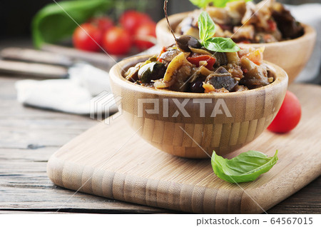 Traditional italian dish with eggplant and tomato 64567015