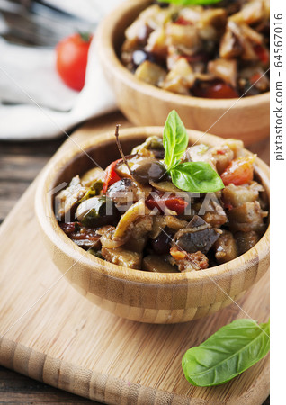 Traditional italian dish with eggplant and tomato Traditional italian dish with eggplant and tomato 64567016