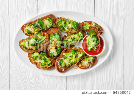 Broccoli melts vegan sandwiches of a rye bread Broccoli melts vegan sandwiches of a rye bread 64568042
