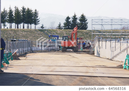 Construction sites and power shovels 64568316