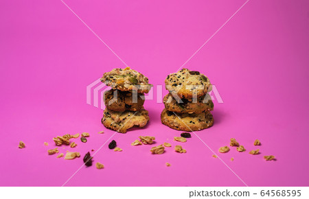Cereal, chocolate, cookies and milk in a glass on Cereal, chocolate, cookies and milk in a glass on 64568595
