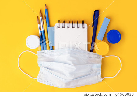 Flat lay composition with notebook, mask, pen, 64569036