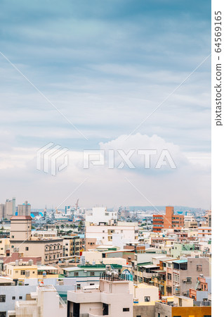 Colorful buildings under blue sky in Cijin island, Kaohsiung, Taiwan 64569165