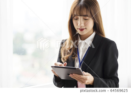 Business scene female Business scene female 64569625