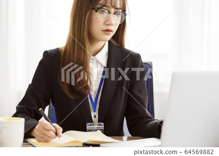 Business scene female 64569882
