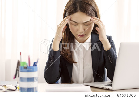 Business woman  stress 64571309