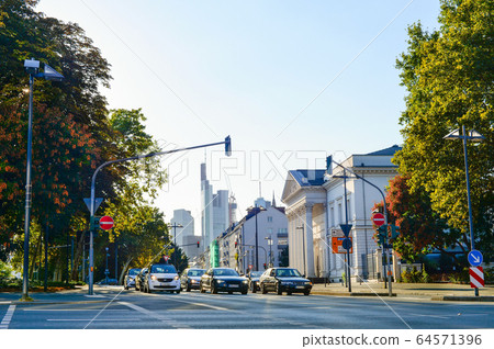 Downtown cityscape, cars, street, Frankfurt 64571396