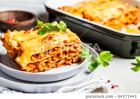Close-up of classic meat lasagna with cheese Close-up of classic meat lasagna with cheese 64571443