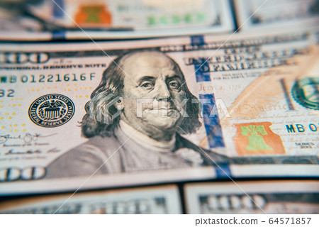American cash dollars close-up. One Hundred Dollar Banknotes. 64571857