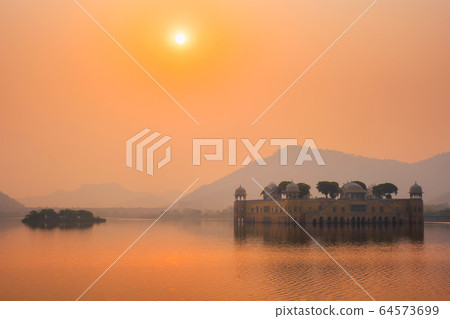 Tranquil morning at Jal Mahal Water Palace at sunrise in Jaipur. Rajasthan, India 64573699