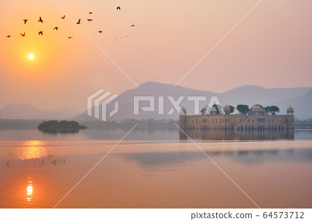Tranquil morning at Jal Mahal Water Palace at sunrise in Jaipur. Rajasthan, India Tranquil morning at Jal Mahal Water Palace at sunrise in Jaipur. Rajasthan, India 64573712