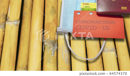 Note CORONAVIRUS COVID-19  and passport. Novel corona virus outbreak.Border control and quarantine of tourists infected with coronavirus. 64574378