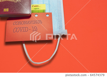 Note CORONAVIRUS COVID-19  and passport. Novel corona virus outbreak.Border control and quarantine of tourists infected with coronavirus. 64574379