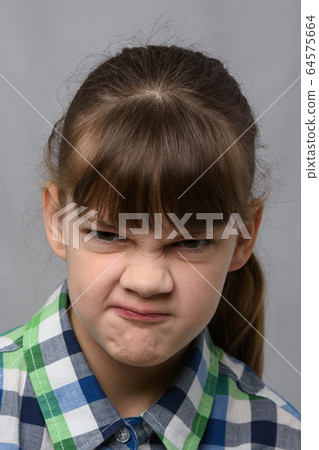 Portrait of a vile ten-year-old girl of European 64575664
