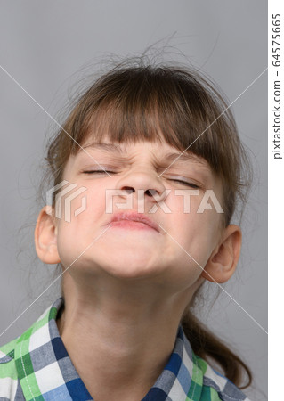 Portrait of an arrogant ten-year-old girl of 64575665