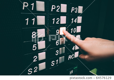 Pressing elevator button with hands, touching public surface with germs, personal hand hygiene care for COVID-19 coronavirus prevention Pressing elevator button with hands, touching public surface with germs, personal hand hygiene care for COVID-19 coronavirus prevention 64576129