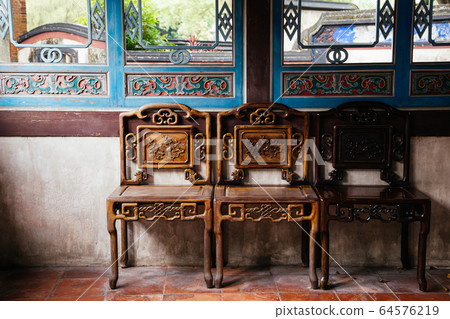 Chinese traditional style chair and interior at Lin Family Mansion and Garden in Taipei, Taiwan 64576219